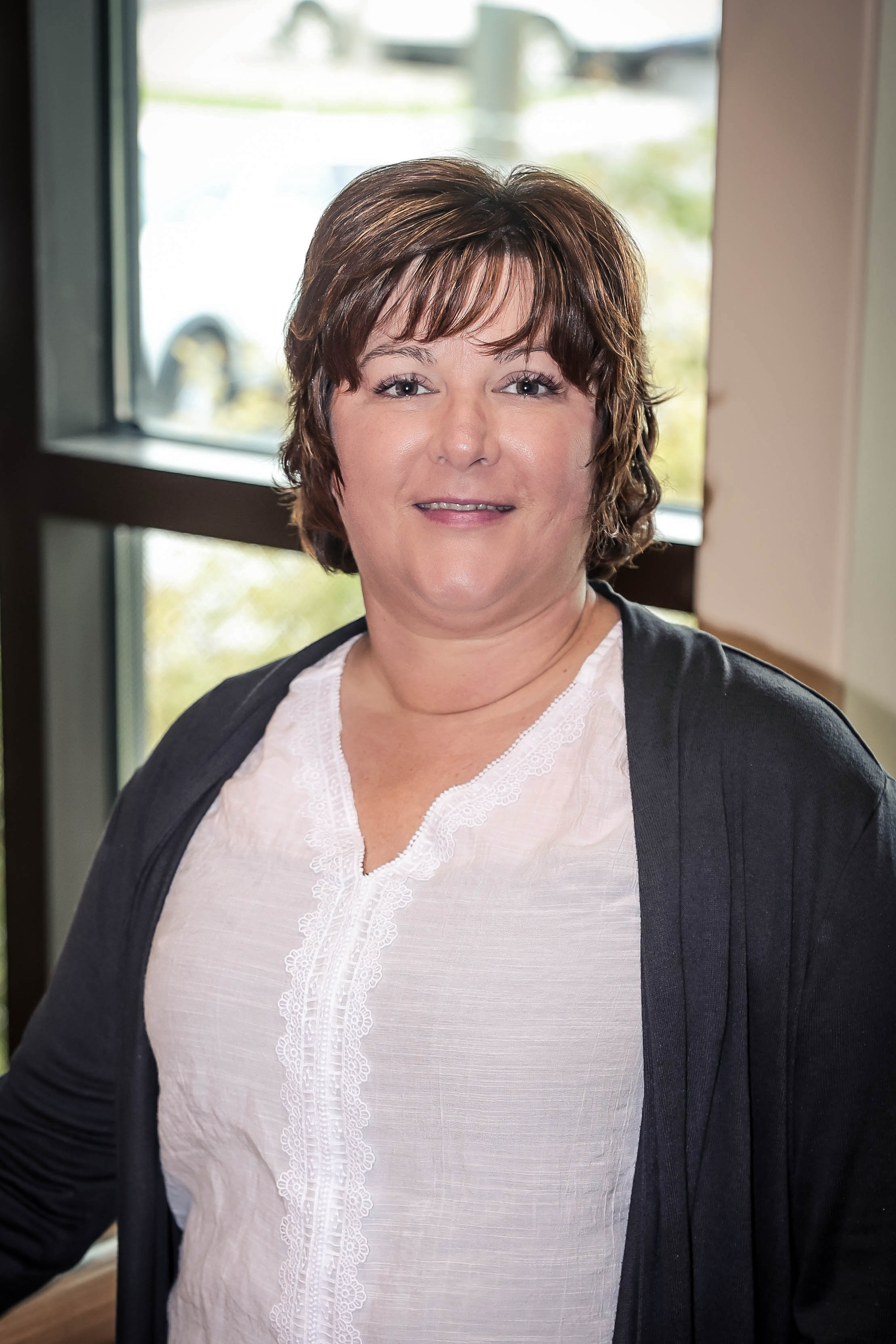 Jana Suazo, Director of Human Resources Maggie Theiler, FNP